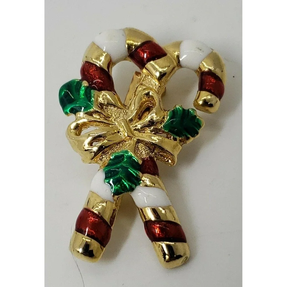 gold tone candy canes with bow and holly Christmas brooch pin